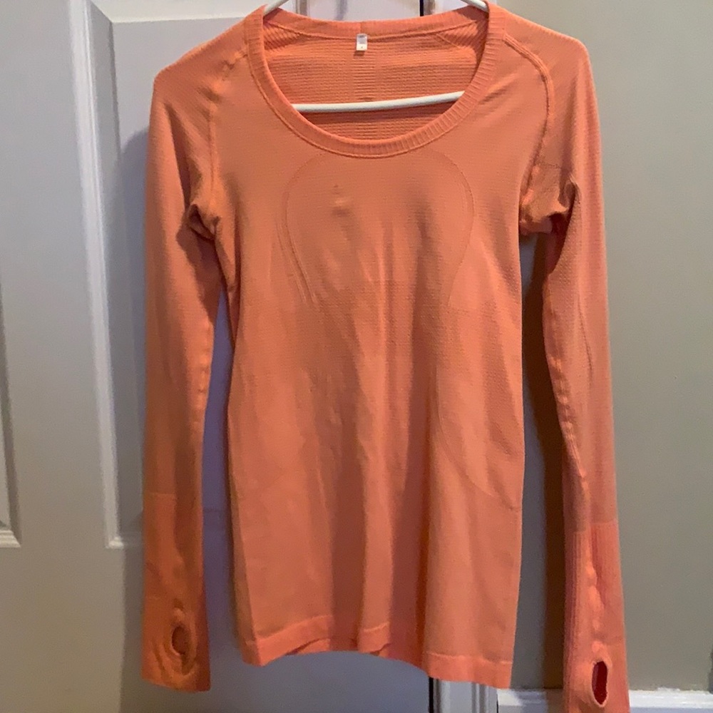 Orange lululemon long sleeved top